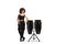 Full length portrait of a young female leaning on conga drums