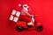 Full length profile photo of grandfather grey beard ride retro moped deliver box wear santa claus x-mas costume