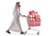 Full length profile shot of an arab man pushing a shopping cart with presents