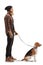 Full length profile shot of a bearded man with a basset hound dog