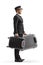 Full length profile shot of a bellboy standing and holding suitcases