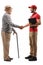 Full length profile shot of a delivery man shaking hands with a senior man with a cane