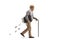 Full length profile shot of an edlery man walking with a cane and carrying a briefcase full of money