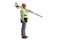 Full length profile shot of a geodetic surveyor carrying a measuring equipment