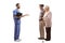 Full length profile shot of a male healthcare worker talking to an elderly couple