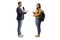 Full length profile shot of a male reporter with a microphone talking to a female student