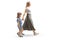 Full length profile shot of a mother and daughter walking holding hands
