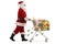 Full length profile shot of Santa Claus walking and pushing a shopping cart with food and money falling