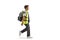 Full length profile shot of a schoolboy wearing a safety vest and walking
