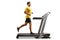 Full length profile shot of a strong young man running on a treadmill