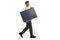 Full length profile shot of a technician carrying a solar panel and walking