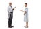 Full length profile shot of a young male patient talking to a mature male doctor