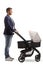 Full length profile shot of a young man pushing a baby carriage