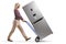 Full length profile shot of a young woman pushing a hand-truck with a new silver fridge