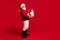 Full length profile side photo amazed old man santa claus headwear hold big gift box get x-mas jolly holly tradition