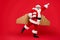 Full length profile side photo of crazy funny elderly superhero santa start launch fly up his rocket wings to give