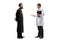 Full length shot of a young male doctor discusiing something with a priest