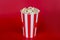 Full length size photo of colorful simple picture of bag full of fresh popcorn isolated bright color background