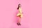 Full-length, size portrait of beautiful gorgeous graceful fragile magnificent refined aerial careless angel girl wearing yellow d