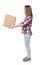 Full length smiling young woman giving cardboard box