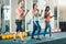 Full length of three fit women exercising with resistance bands