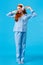 Full-length vertical shot cheerful and upbeat, carefree redhead teenage girl dancing and enjoying beautiful morning