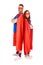 full length view of couple of superheroes in costumes standing with crossed arms and looking at camera