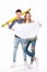 Full length view of young couple standing together with blueprint and level tool