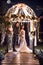 Full length of wedding couple dancing in illuminated gazebo at night