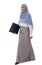 Full length of young happy asian Muslim woman walking with black folder in hand with documents isolated white background