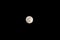 Full moon on a black cloudless sky. A natural satellite