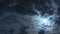 Full moon with black rays and clouds. Nighttime timelapse. Clouds floating through the bright disk of the moon. Smooth
