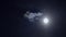 Full moon on dark cloudy sky. Clouds passing by the moon at midnight