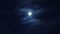 Full moon in dark night cloudy sky
