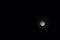 Full moon on dark night sky. Skyscape with moon phase in equator.