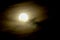 Full moon on dark sky with mist