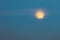 Full moon at dusk and little cloud in front natural background