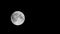 Full moon is moving across the black sky, was observed in latitude 54, Longitude: 73 Time-lapse