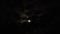 Full moon in the night sky. Dark clouds roll over the moon, but Earth`s satellite reappears. Night sky. Scary, creepy theme