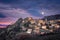 Full moon over Balagne village of Speloncato in Corsica