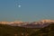 Full moon over the mountains landscape near Talgar peak, Tien-Shan, Almaty, Kazakhstan