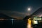 Full moon over night village Limone on Garda Lake