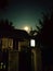 Full moon photo. House in the village