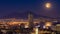 Full moon rises above Mount Vesuvius, Naples and Bay of Naples, Italy