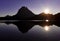 The full moon rises behind Mount Midi d`Ossau and is reflected in the gentau lake, Ayous Lakes