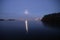 Full moon is rising above Nesselande beach reflecting on the Zevenhuizerplas as seen at Oud Verlaat just after sunset.