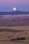 Full moon rising at dusk from Steptoe Butte, Palouse Valley, eastern Washington State