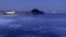 Full moon at sunrise on the zurriola beach, city of Donostia - San Sebastian, Euskadi