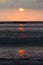 Full moon sunset and fishing boat , chorrillos, lima, peru. water sky clouid