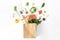 Full paper bag different healthy food white background Top view Flat lay